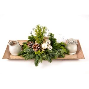 Kerststuk opgemaakt met naturel kleuren